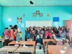 A group of people in a classroom AI-generated content may be incorrect.