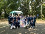 A group of people posing for a photo AI-generated content may be incorrect.