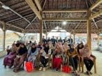 A group of women sitting in chairs under a roof AI-generated content may be incorrect.