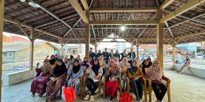 A group of women sitting in chairs under a roof AI-generated content may be incorrect.